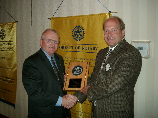 President Warcup Thanking Former President Schmisek.jpg